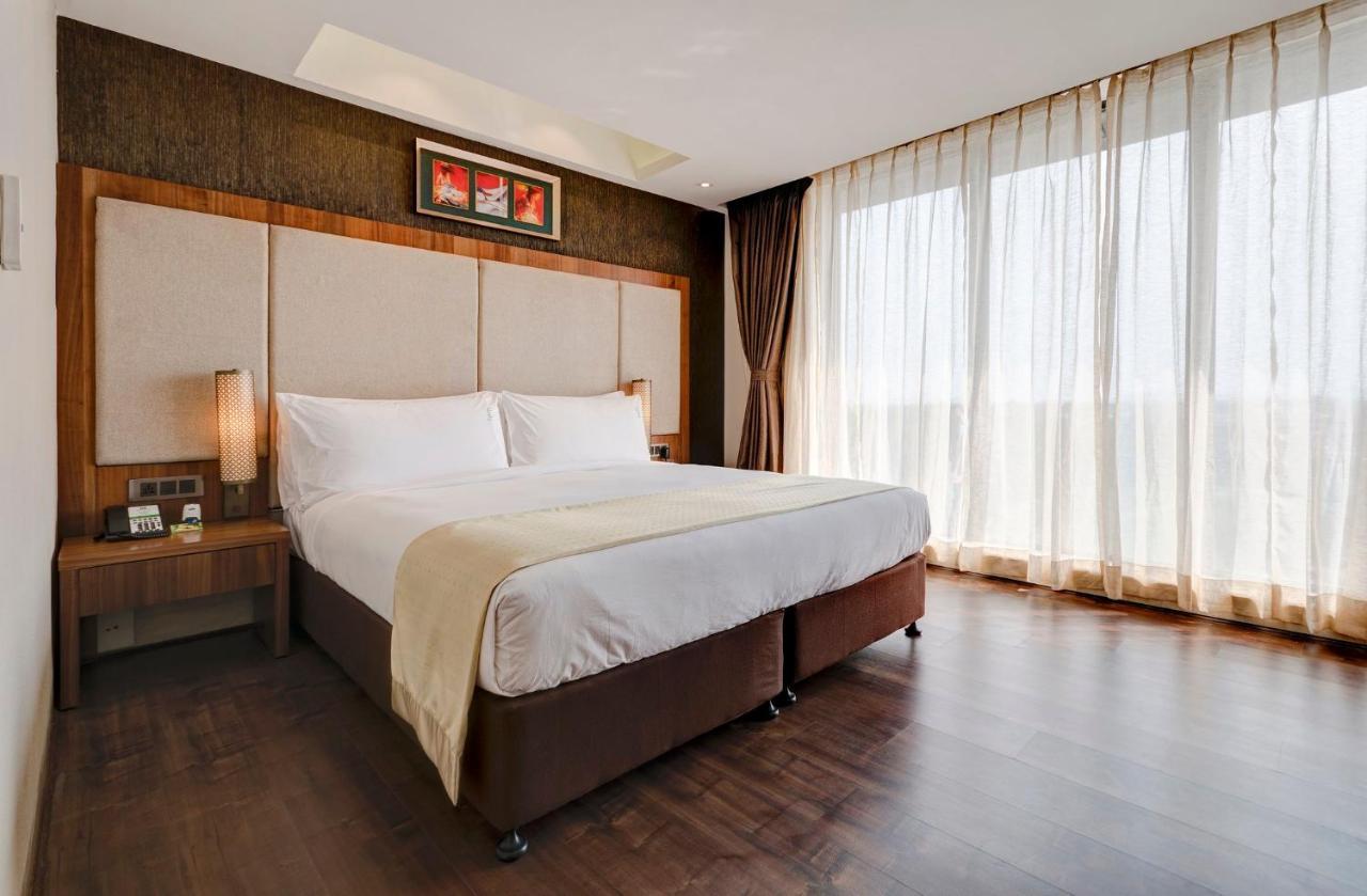 Holiday Inn Kolkata Airport By Ihg Eksteriør bilde A bedroom at the hotel